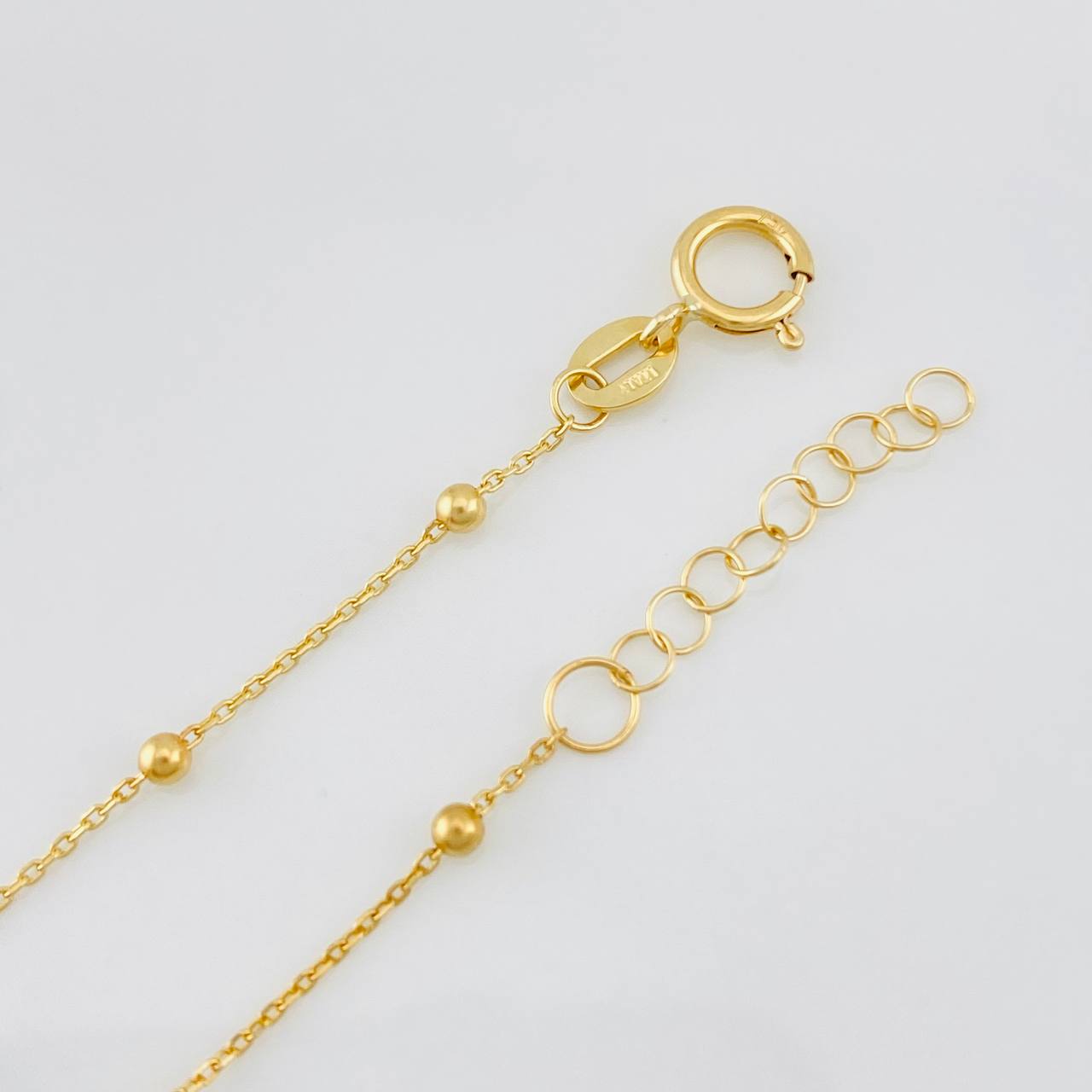 Pulso Modulable Aro Seguido Cruz 1.5g / 18.1cm - 16.3cm / 0.84mm Oro Amarillo 18K