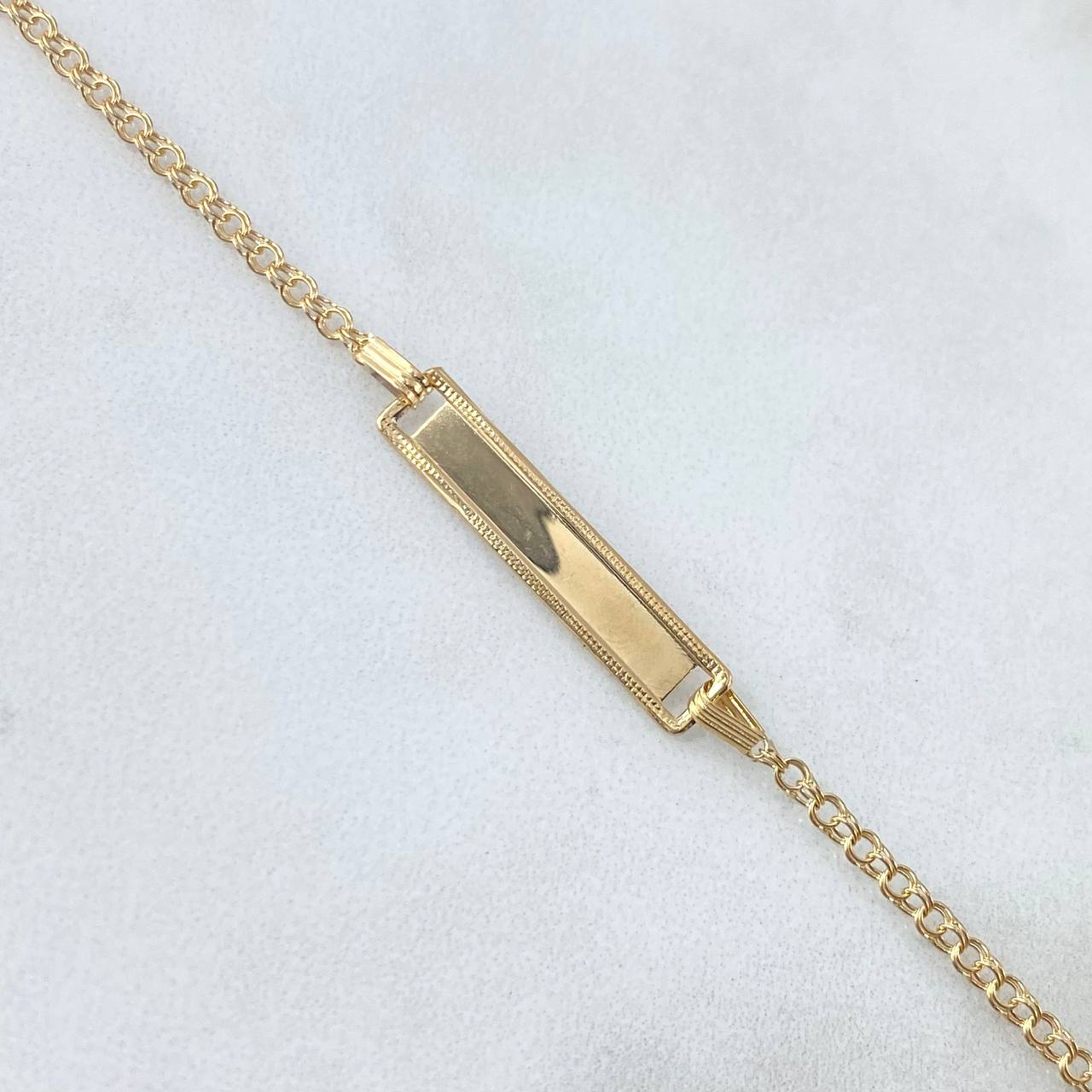 Pulso Aro Seguido 1.25gr / 12cm-13.5cm / Placa Rectangular Bordeada Oro Amarillo