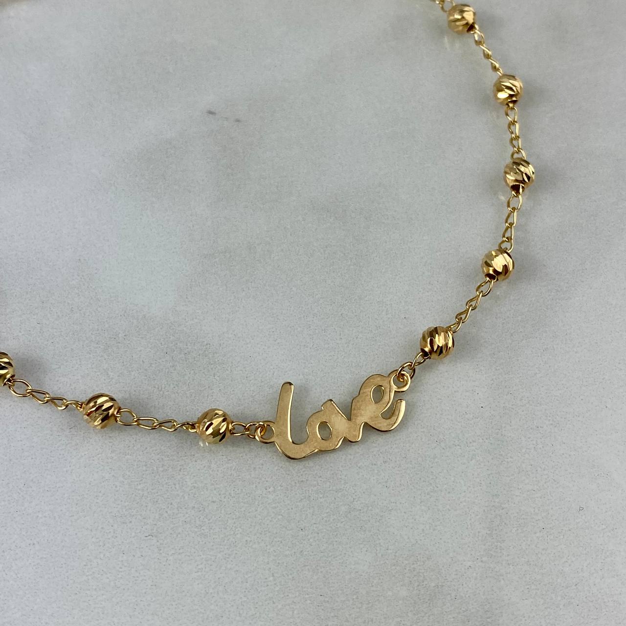 Tobillera Love 4.15gr / 25cm / 4mm Bolas Diamantadas Oro Amarillo