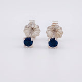 Topos Cuatro Garras Zafiros 12pts 0.7g / 2.7mm Oro Blanco 18K