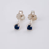 Topos Cuatro Garras Zafiros 12pts 0.7g / 2.7mm Oro Blanco 18K