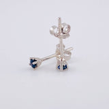 Topos Cuatro Garras Zafiros 12pts 0.7g / 2.7mm Oro Blanco 18K
