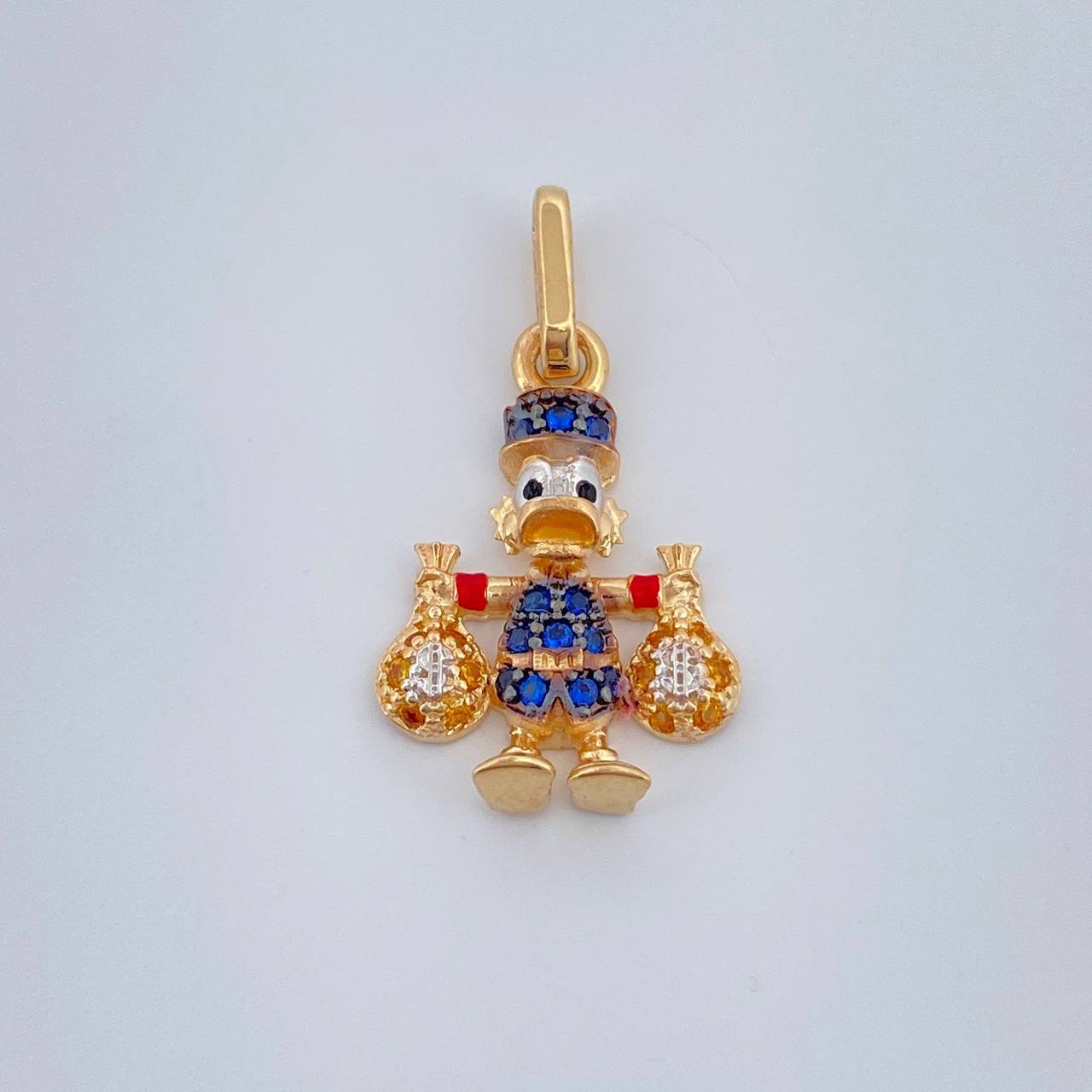 Dije Pato Bolsa Dinero 1.6gr / 2.2cm / Tres Oros 18K %