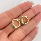 Candongas Omega Esmeraldas 0.97pts 2.5g / 1.05cm Oro Amarillo 18K