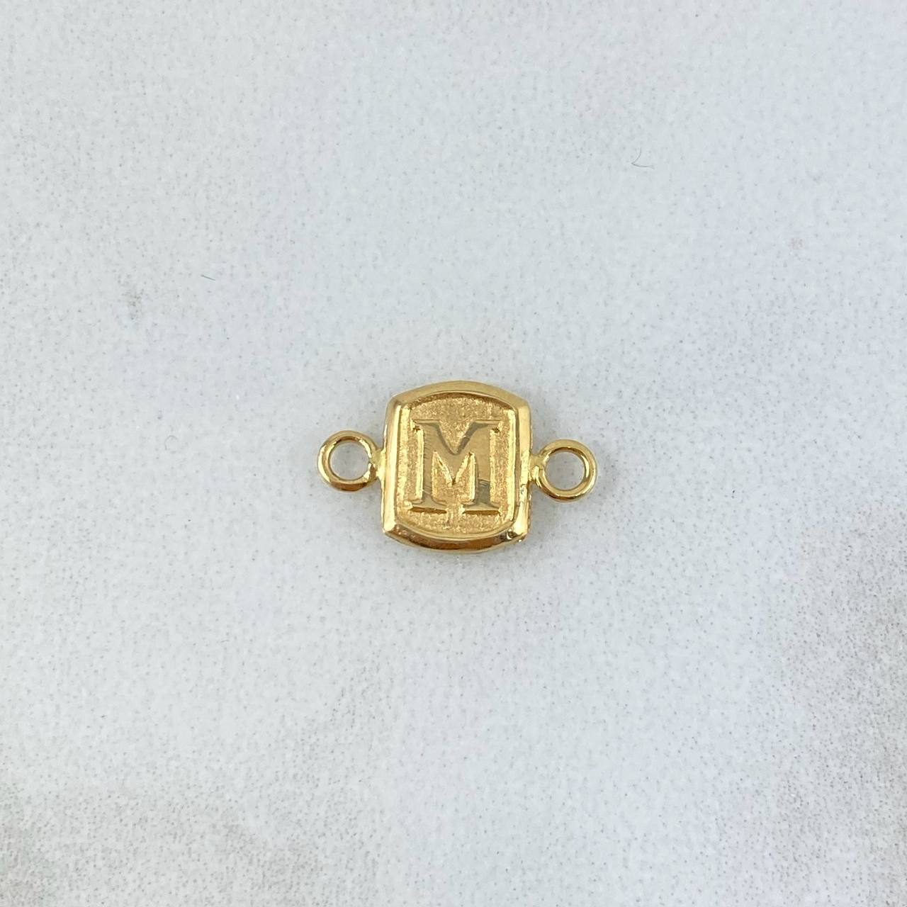Herraje Letra M 0.3gr / 1.3cm / Marco Cuadrado Oro Amarillo