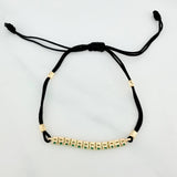 Pulsera Tejida Negra Retazo Tennis Oro Amarillo 18K