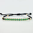 Pulsera Tejida Negra Retazo Tennis Oro Amarillo 18K