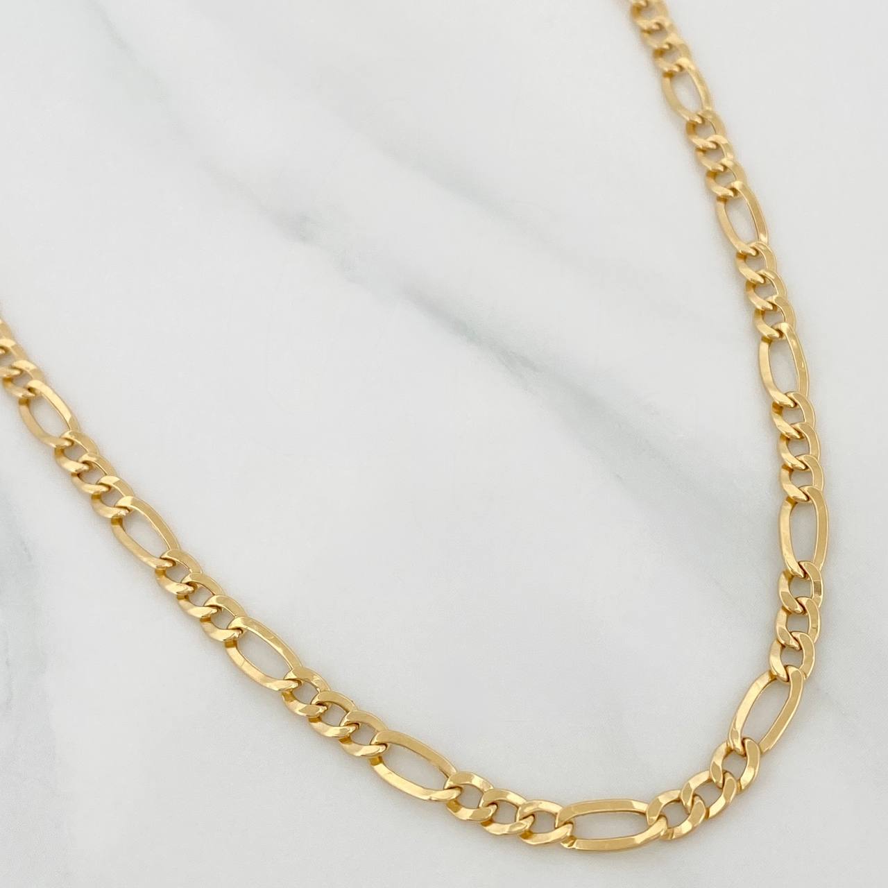 Cadena Figaro 5gr / 71.1cm / 3.34mm Oro Amarillo +1 18K $