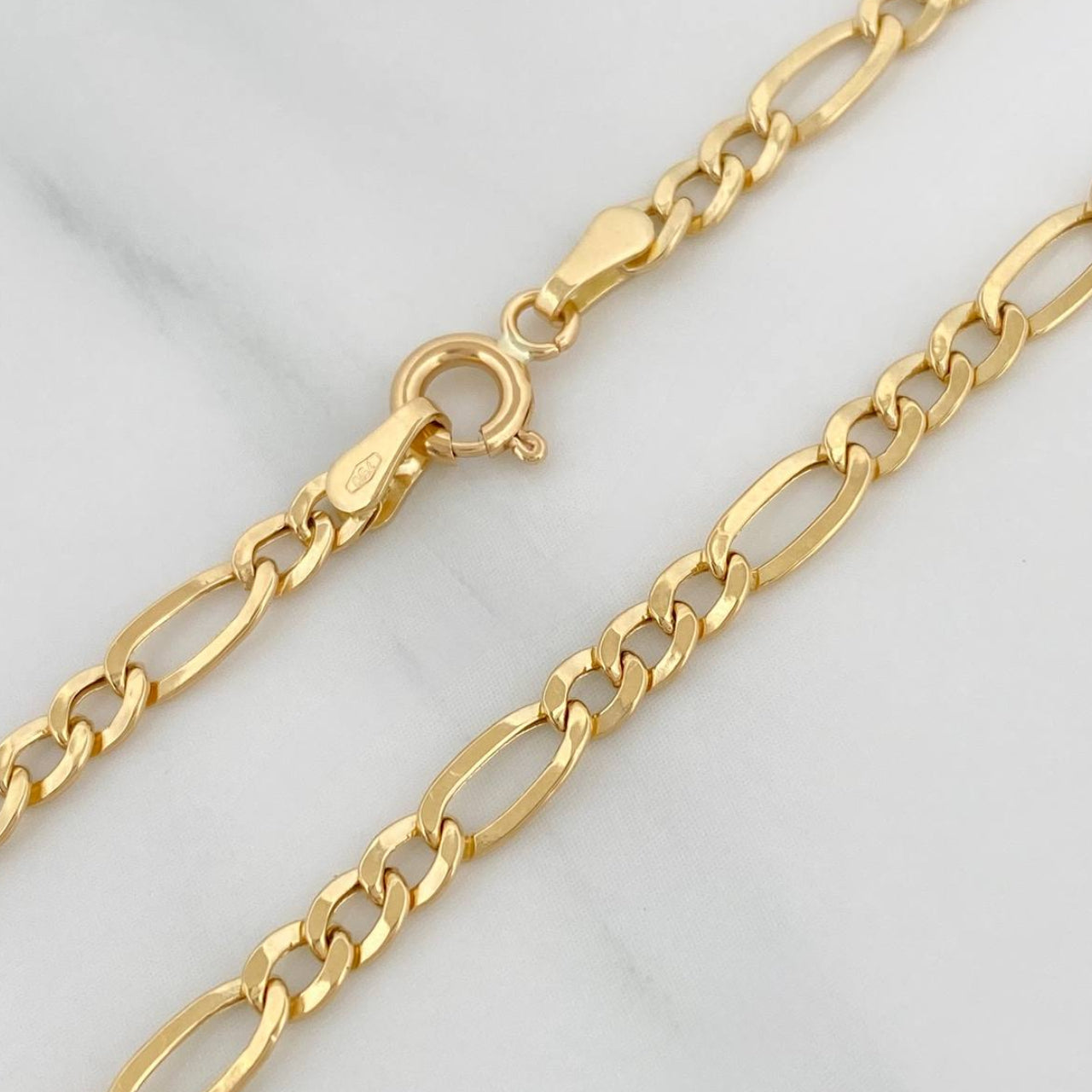 Cadena Figaro 7.65gr / 72.8cm / 4.58mm Oro Amarillo +1 18K $