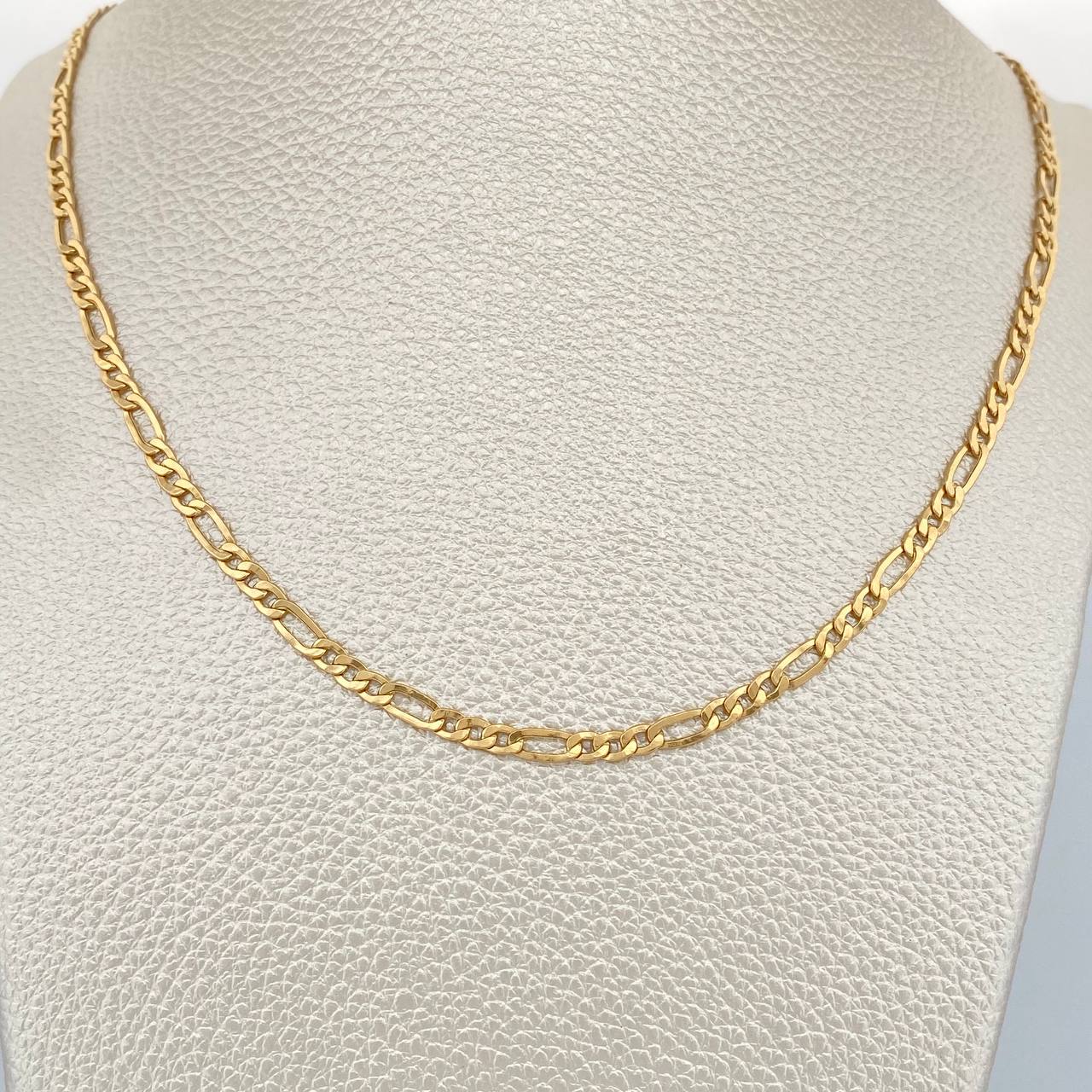 Cadena Figaro 5.45gr / 60.7cm / 3.17mm Oro Amarillo +1 18K $