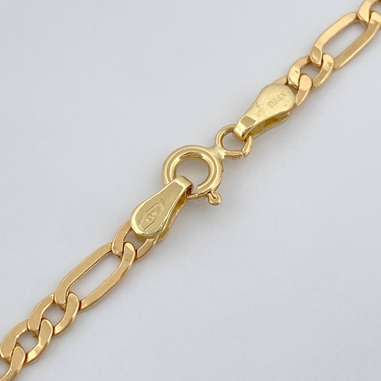 Cadena Figaro 5.45gr / 60.7cm / 3.17mm Oro Amarillo +1 18K $