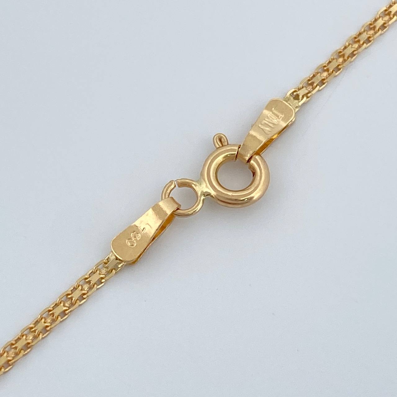 Cadena China 3.15gr / 60.3cm / 1.38mm Oro Amarillo +1 18K $