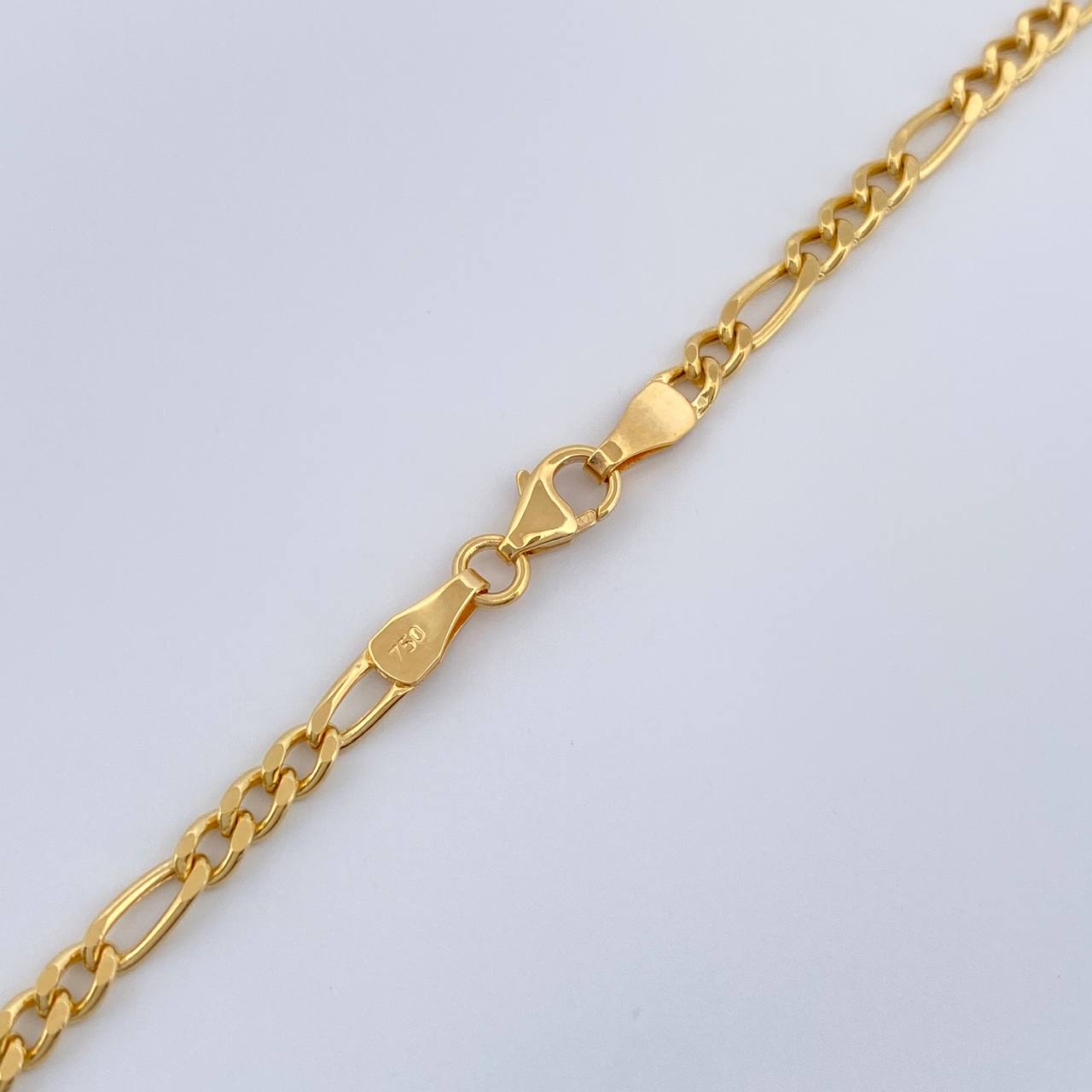 Cadena Figaro 6.5gr / 60.2cm / 2.93mm Oro Amarillo +1 18K $