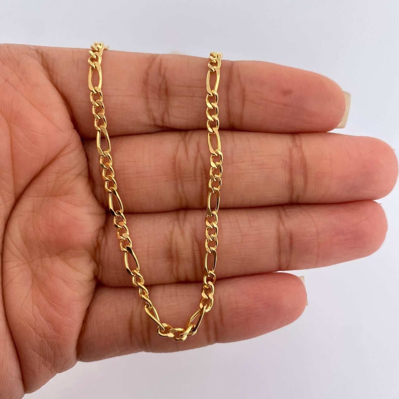 Cadena Figaro 6.5gr / 60.2cm / 2.93mm Oro Amarillo +1 18K $