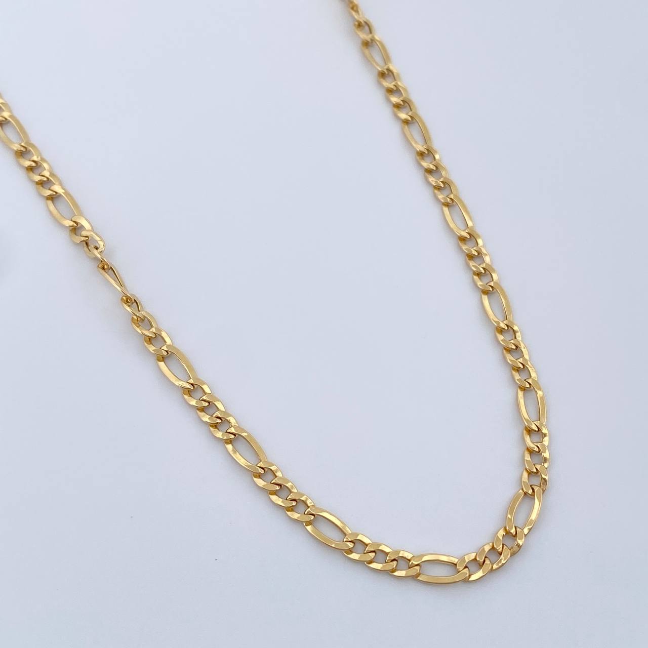 Cadena Figaro 6.5gr / 60.2cm / 2.93mm Oro Amarillo +1 18K $