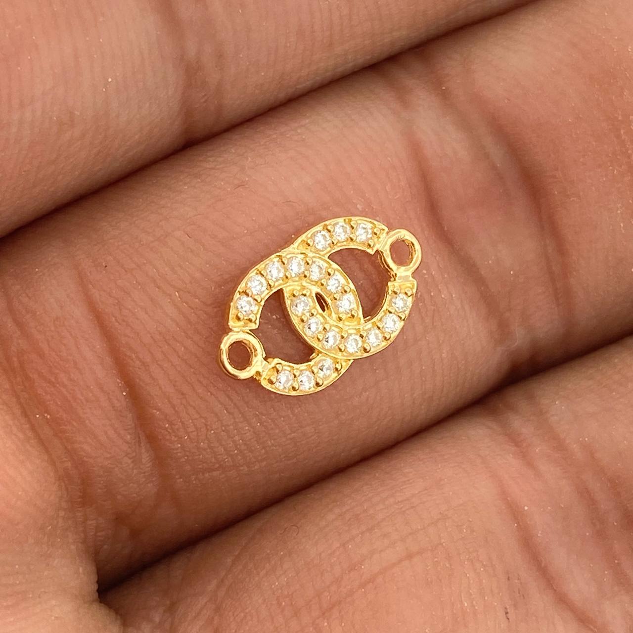 Herraje Olas Cruzadas 0.6gr / 1.2cm / Oro Amarillo 18K %
