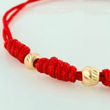 Pulsera Tejida Roja 7 Nudos 6 Bolas Diamantadas Oro Amarillo 18K