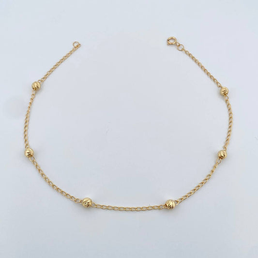 Tobillera Espiga 1.9gr / 24.8cm / 4mm Oro Amarillo 18K %