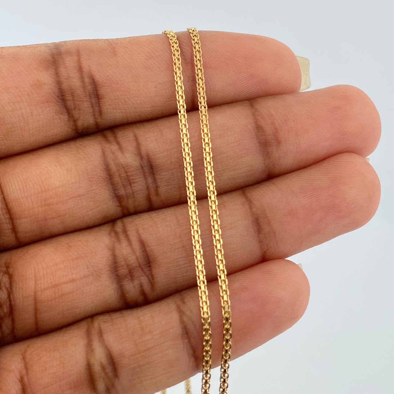 Cadena China 3.2gr / 60cm / 1.3mm Oro Amarillo +1 18K $