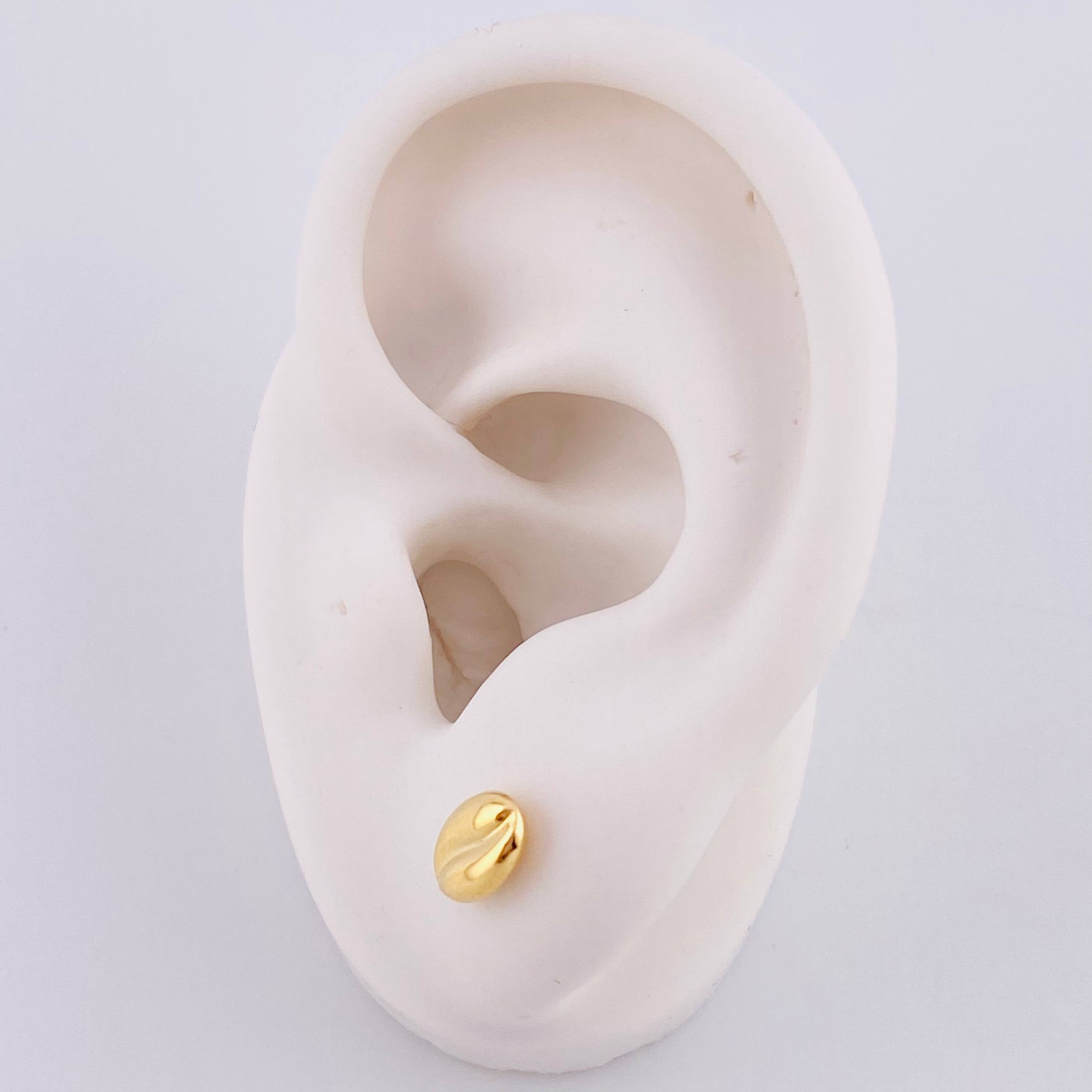 Topos Grano de Café 0.6g / 7.6mm Oro Amarillo 18K