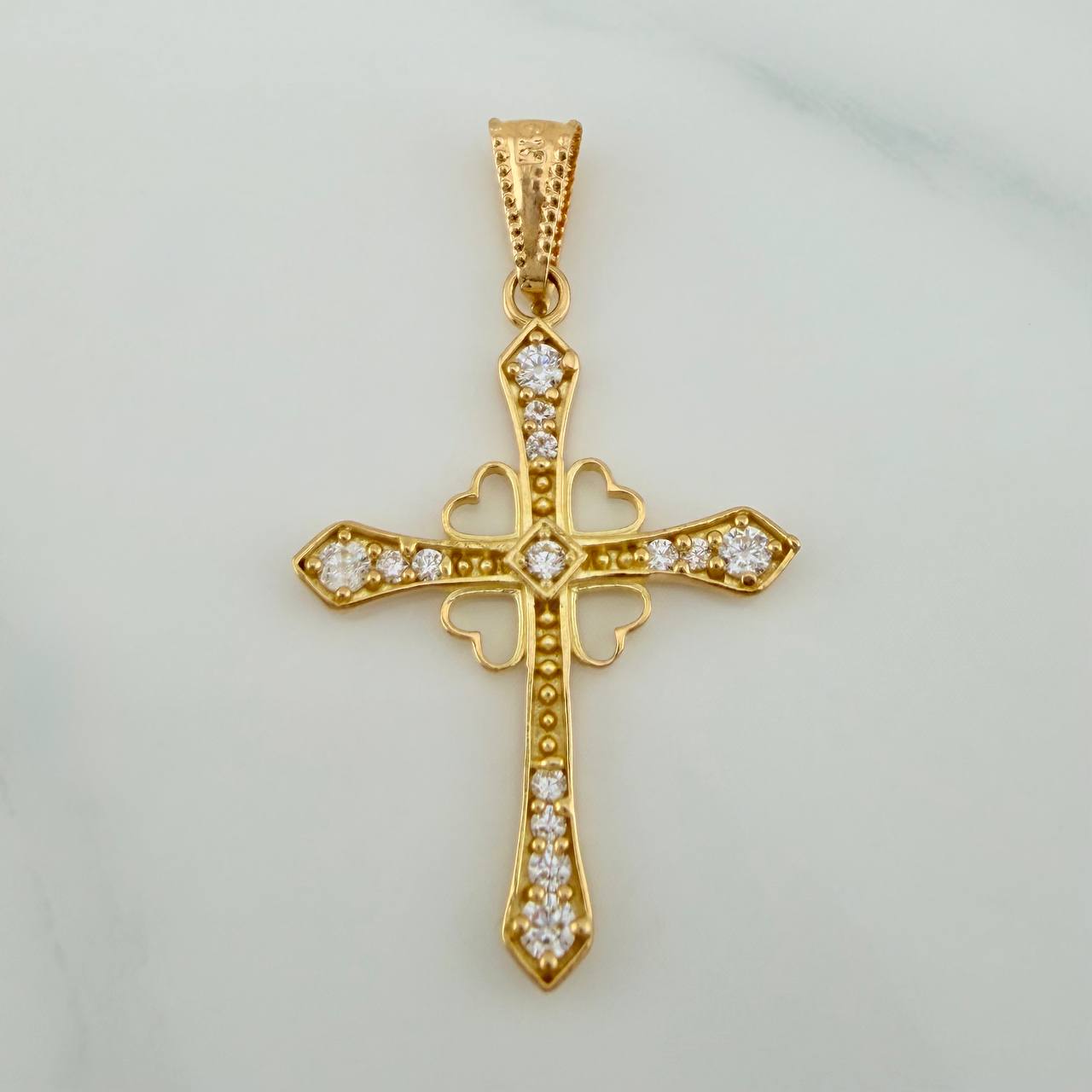 Dije Cruz Corazones 1.3gr / 3.3cm / Oro Amarillo 18K $