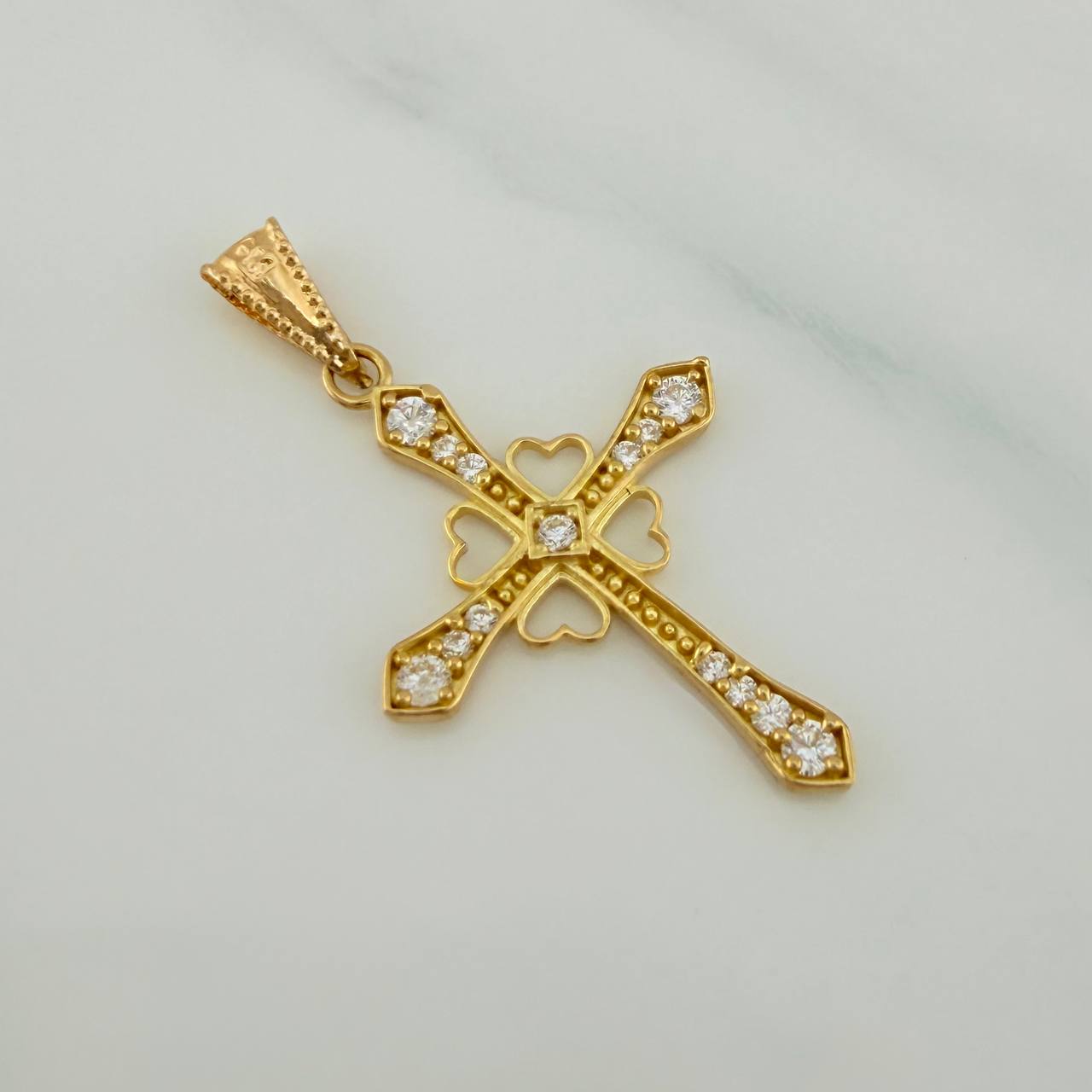 Dije Cruz Corazones 1.3gr / 3.3cm / Oro Amarillo 18K $