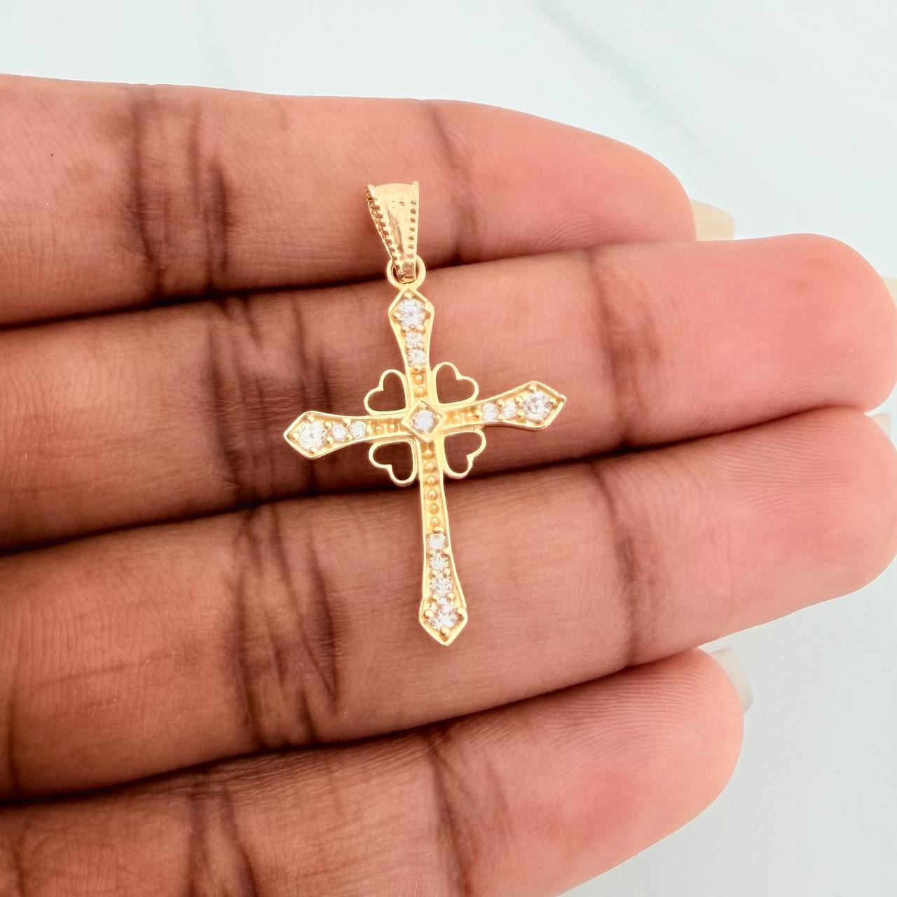 Dije Cruz Corazones 1.3gr / 3.3cm / Oro Amarillo 18K $