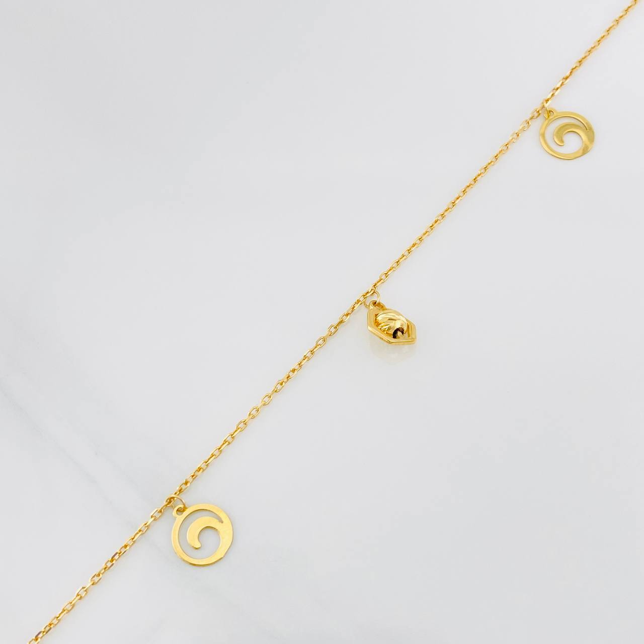 Tobillera Aro Seguido Figuras 2.45g / 23cm / 1mm Oro Amarillo 18K