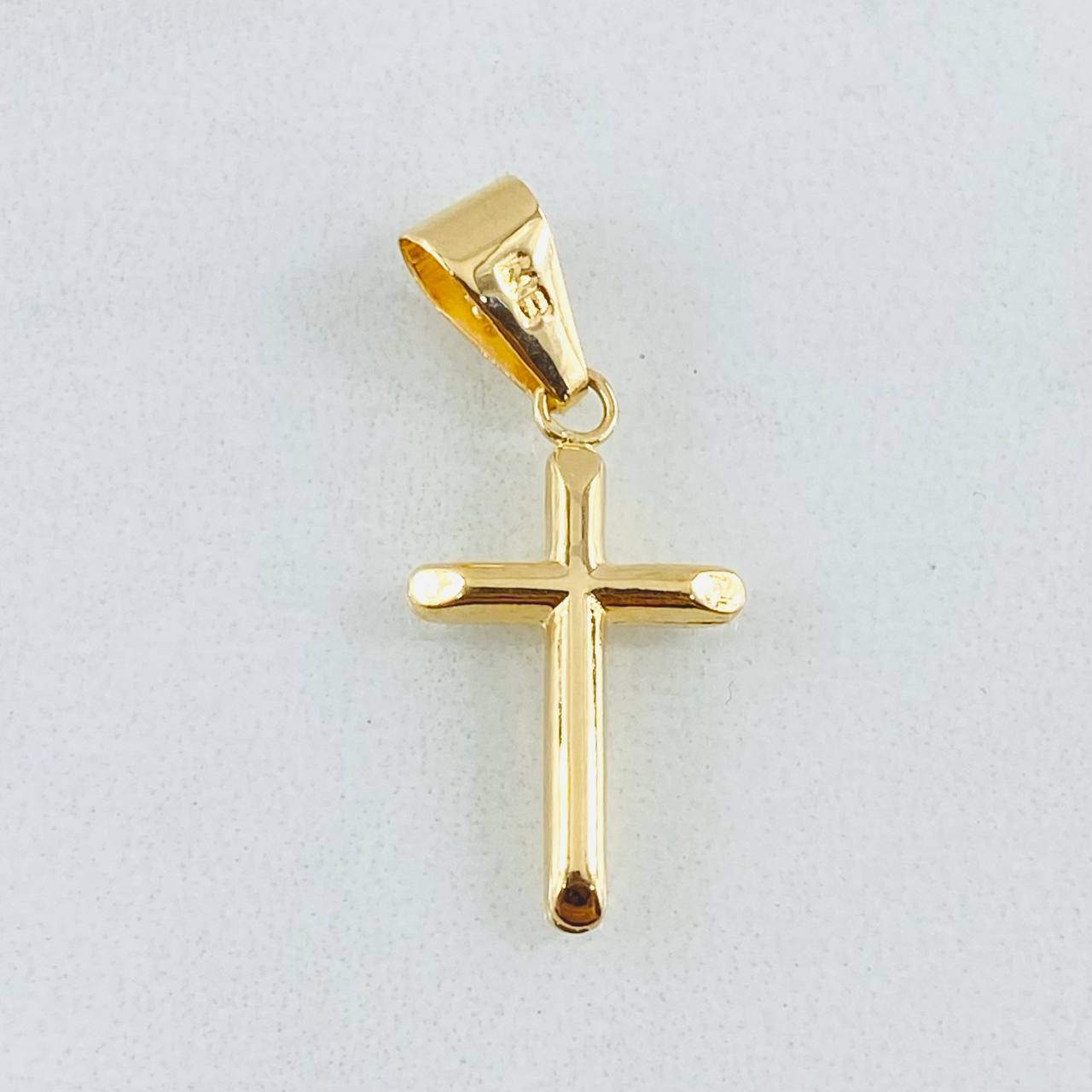 Dije Cruz 0.55gr / 2.5cm / Oro Amarillo 18K