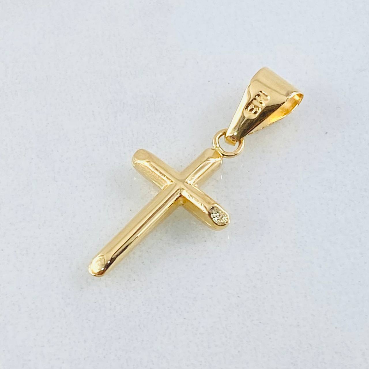 Dije Cruz 0.55gr / 2.5cm / Oro Amarillo 18K