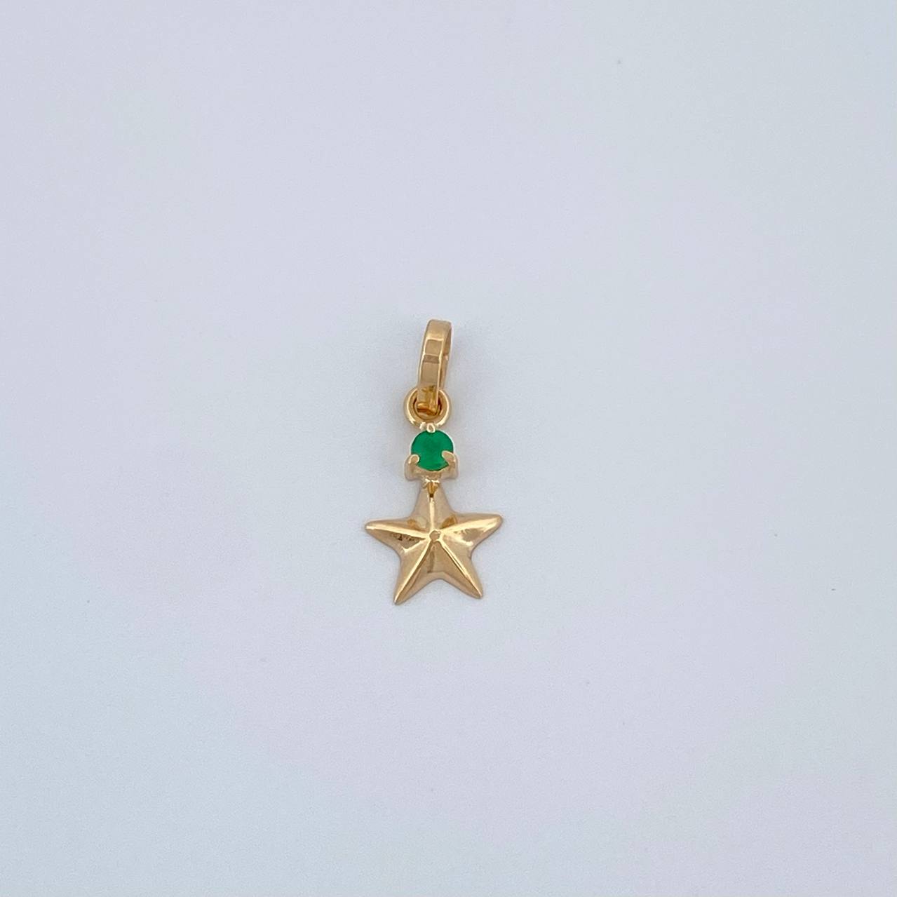 Dije Estrella Esmeralda 0.25gr / 1.4cm / Oro Amarillo 18K %