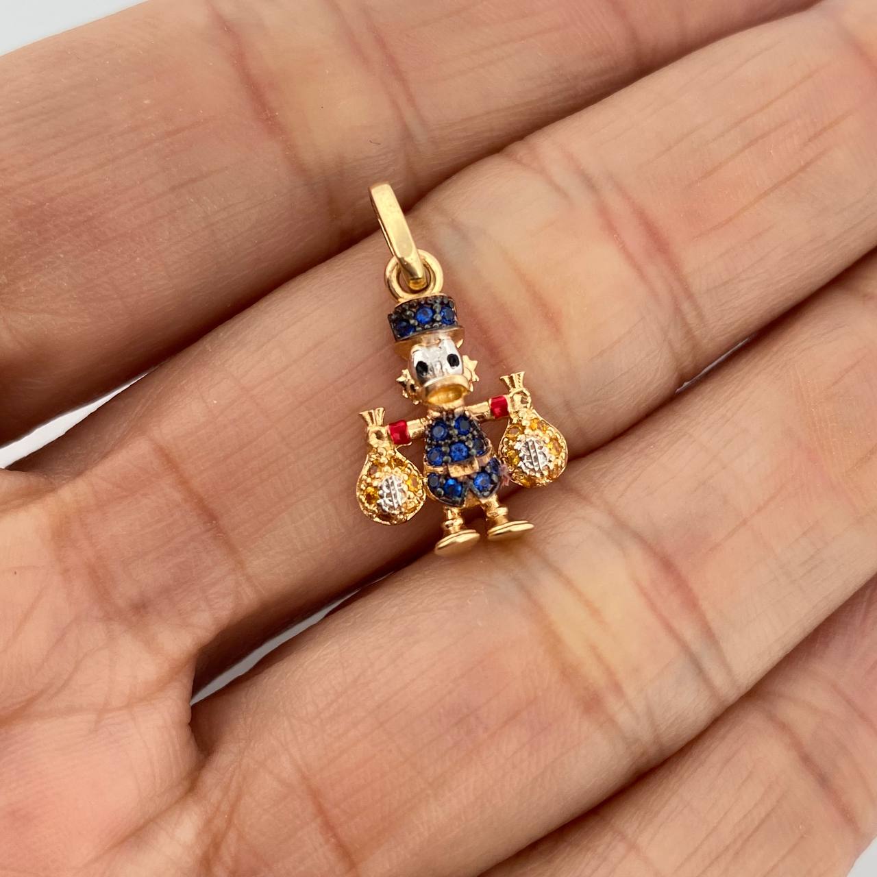 Dije Pato Bolsa Dinero 1.6gr / 2.2cm / Tres Oros 18K %