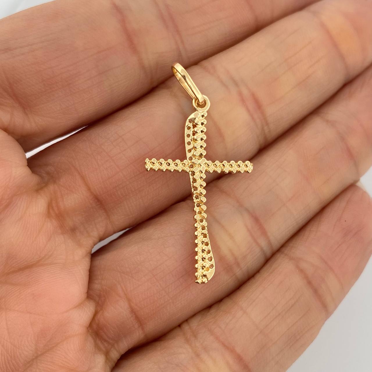 Dije Cruz Curva 1.6gr / 3.3cm / Oro Amarillo 18K %