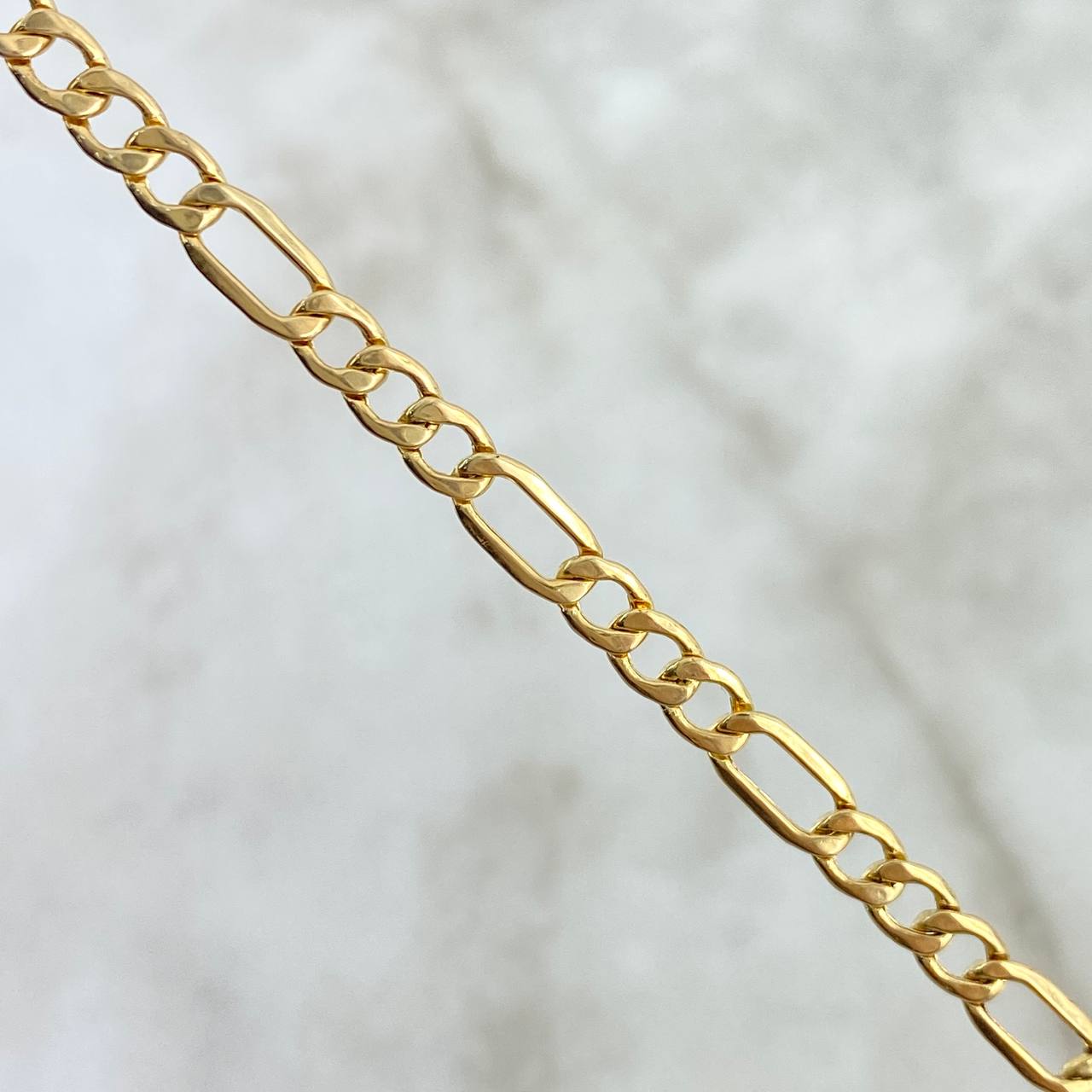 Cadena Figaro 6.4gr / 60cm / 2.95mm Oro Amarillo +0$