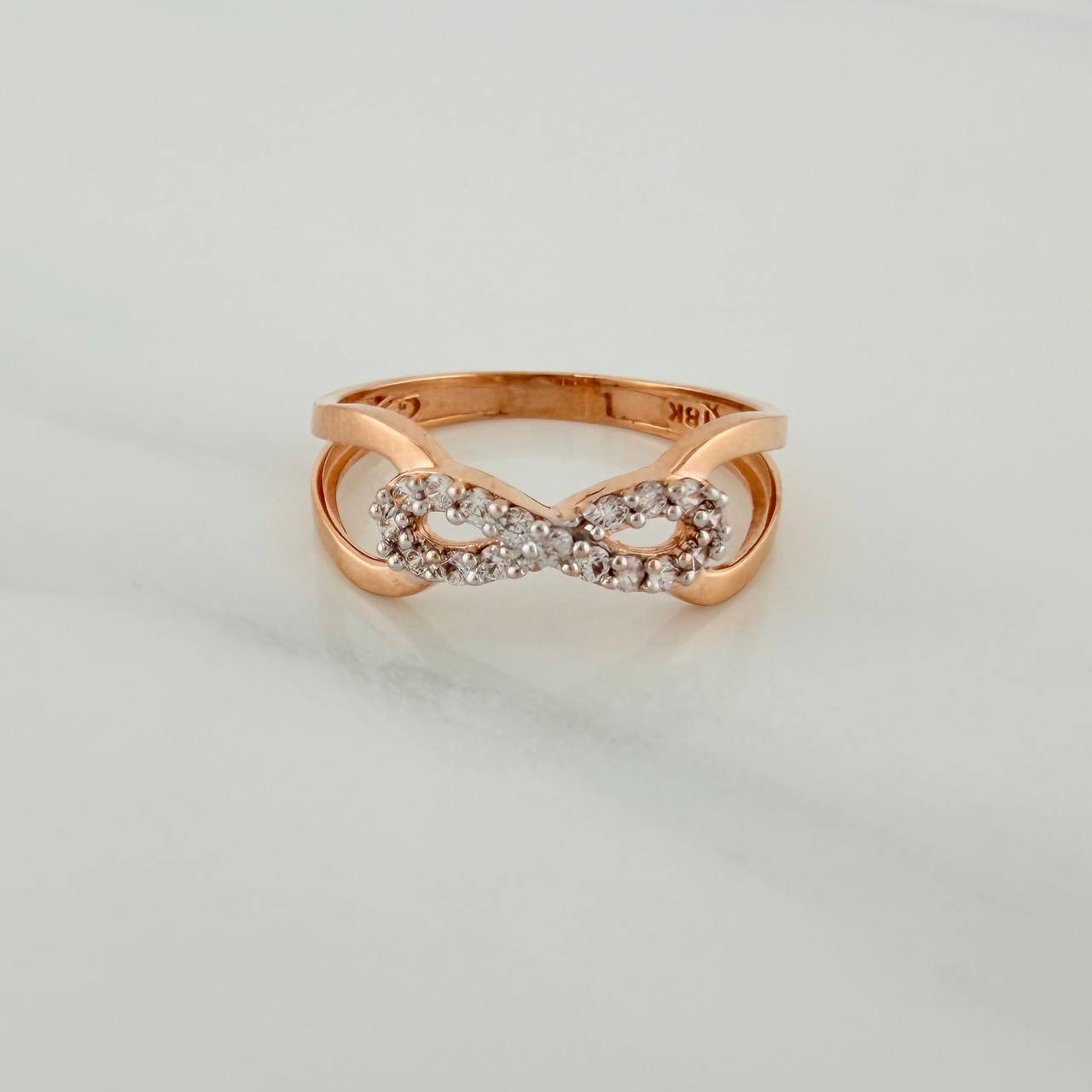 Anillo Infinito 1.8gr / T5 1/4 / Dos Oros Blanco Rosa 18K $