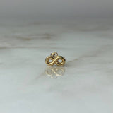 Dije Infinito  0.35gr / 1.1cm Troquelado Oro Amarillo