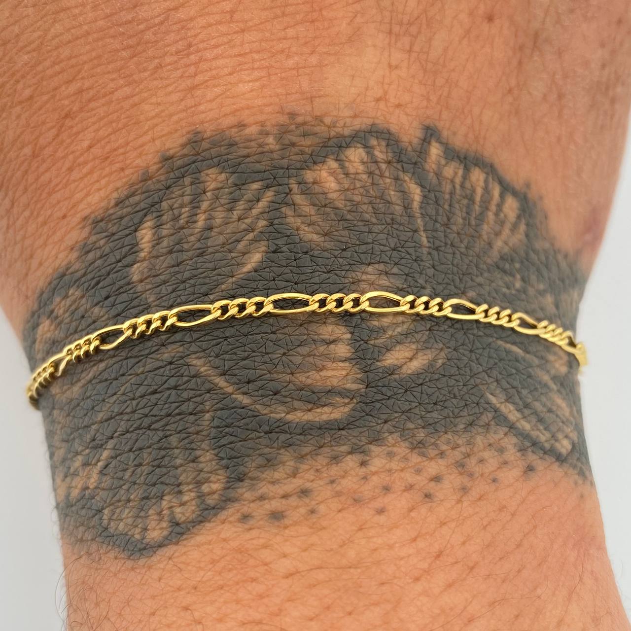 Pulso Figaro 0.9gr / 18cm / 1.8mm Oro Amarillo +1 18K $