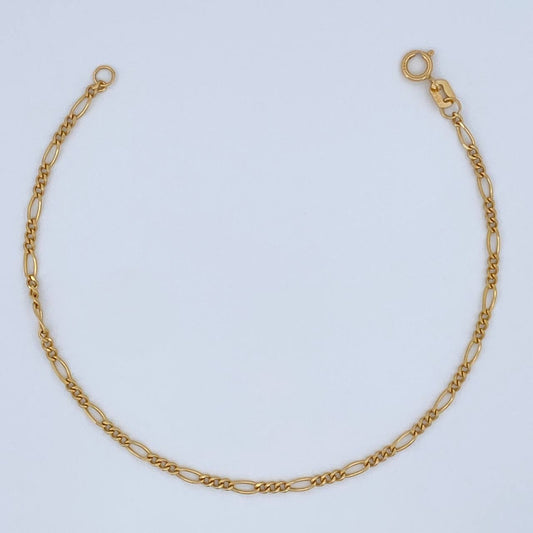 Pulso Figaro 0.9gr / 18cm / 1.8mm Oro Amarillo +1 18K $