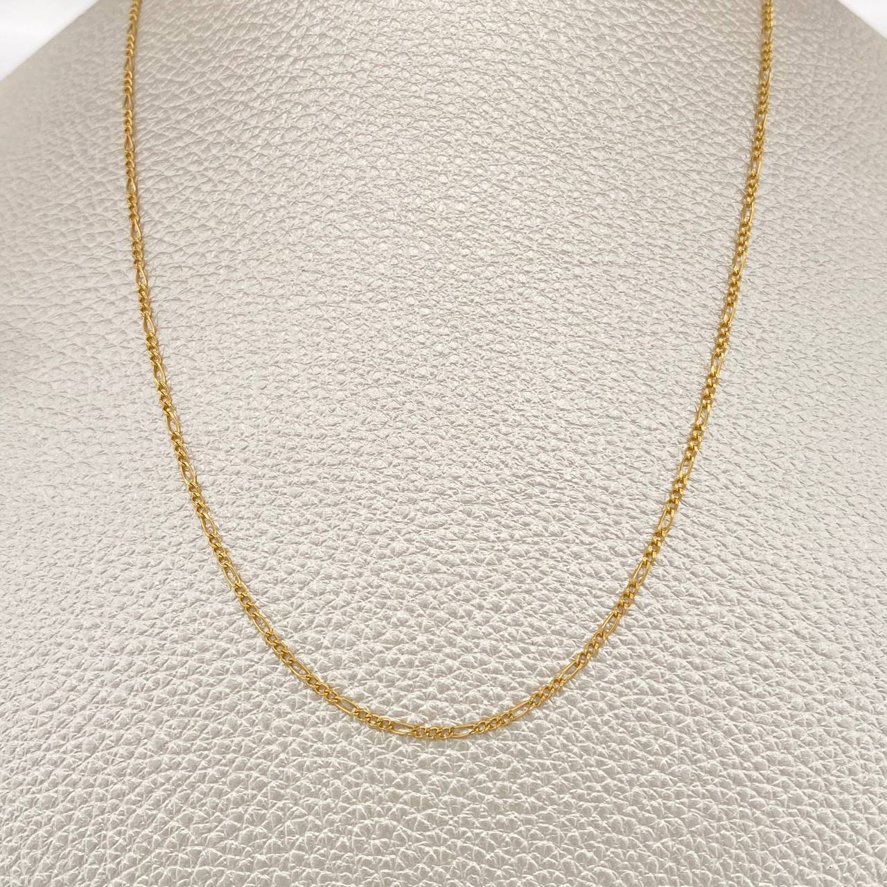 Cadena Figaro 1.3gr / 59.6cm / 1.31mm Oro Amarillo +1 18K %