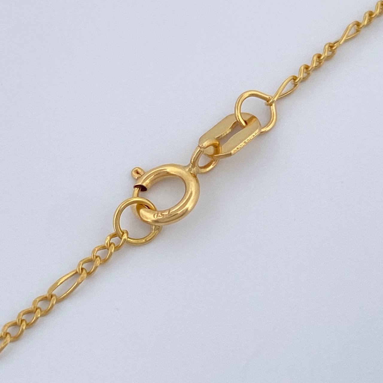 Cadena Figaro 1.35gr / 55.5cm / 1.15mm Oro Amarillo +1 18K $