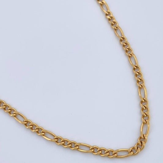 Cadena Figaro 7gr / 60.3cm / 3mm Oro Amarillo +1 18K $