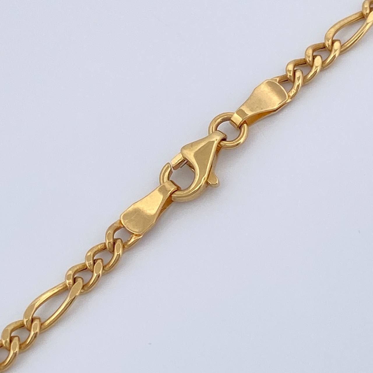 Cadena Figaro 7gr / 60.3cm / 3mm Oro Amarillo +1 18K $