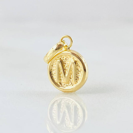 Dije Letra M 0.4gr / 1.5cm / Oro Amarillo 18K ©