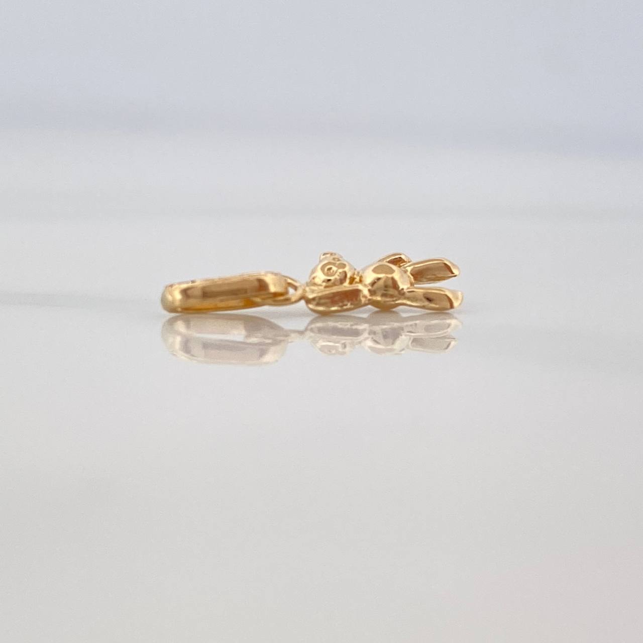 Dije Oso Mano Arriba 0.2gr / 1.4cm / Oro Amarillo 18K %