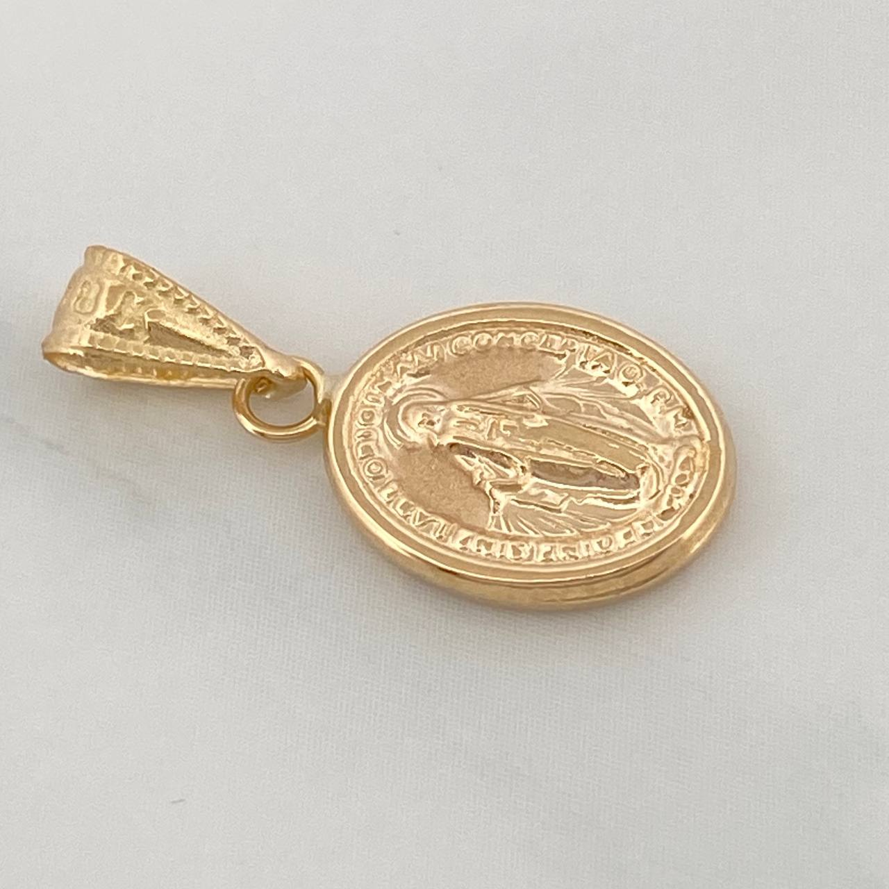 Dije Virgen Milagrosa 0.7gr / 2cm / Oro Amarillo 18K %