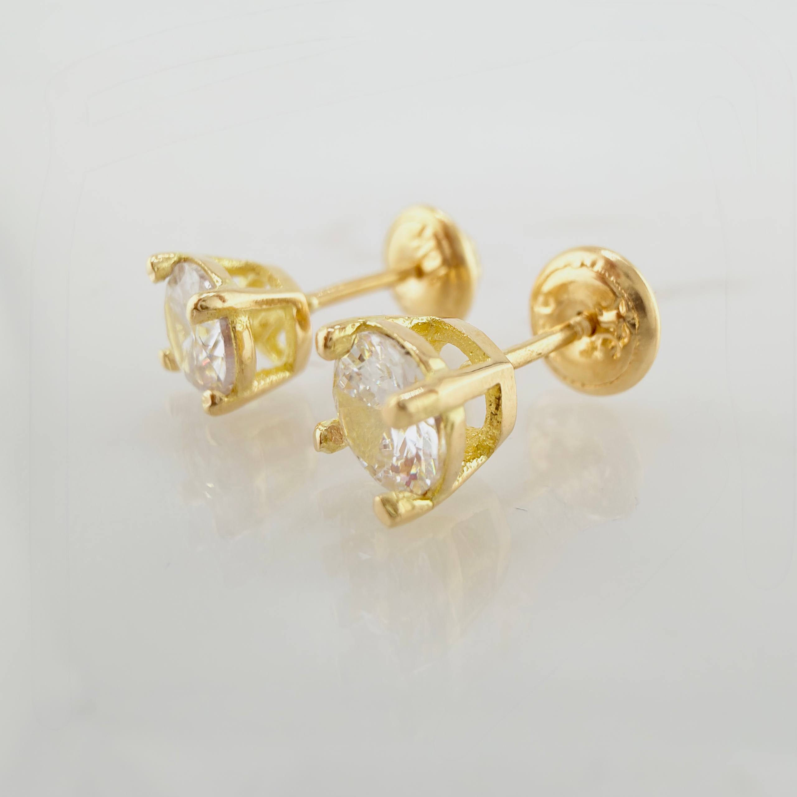 Topos Bisel 1.4gr / 5.2mm Oro Amarillo 18K ©