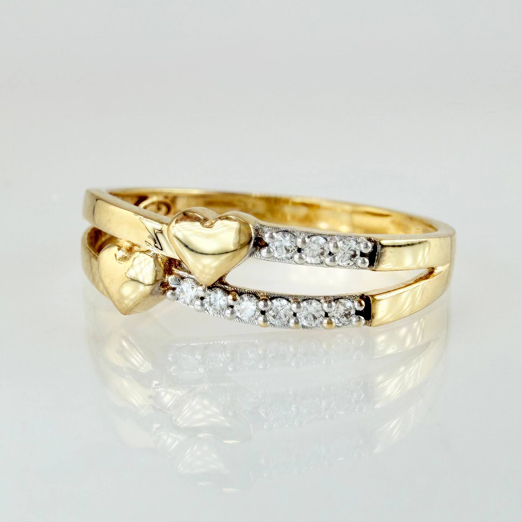 Anillo Doble Linea Corazones 2.35gr / T7 1/2 / Oro Amarillo 18K ©
