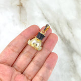 Dije Pato Millonario 8.9gr / 3.4cm / Circones Blancos y Negros Oro Amarillo ©