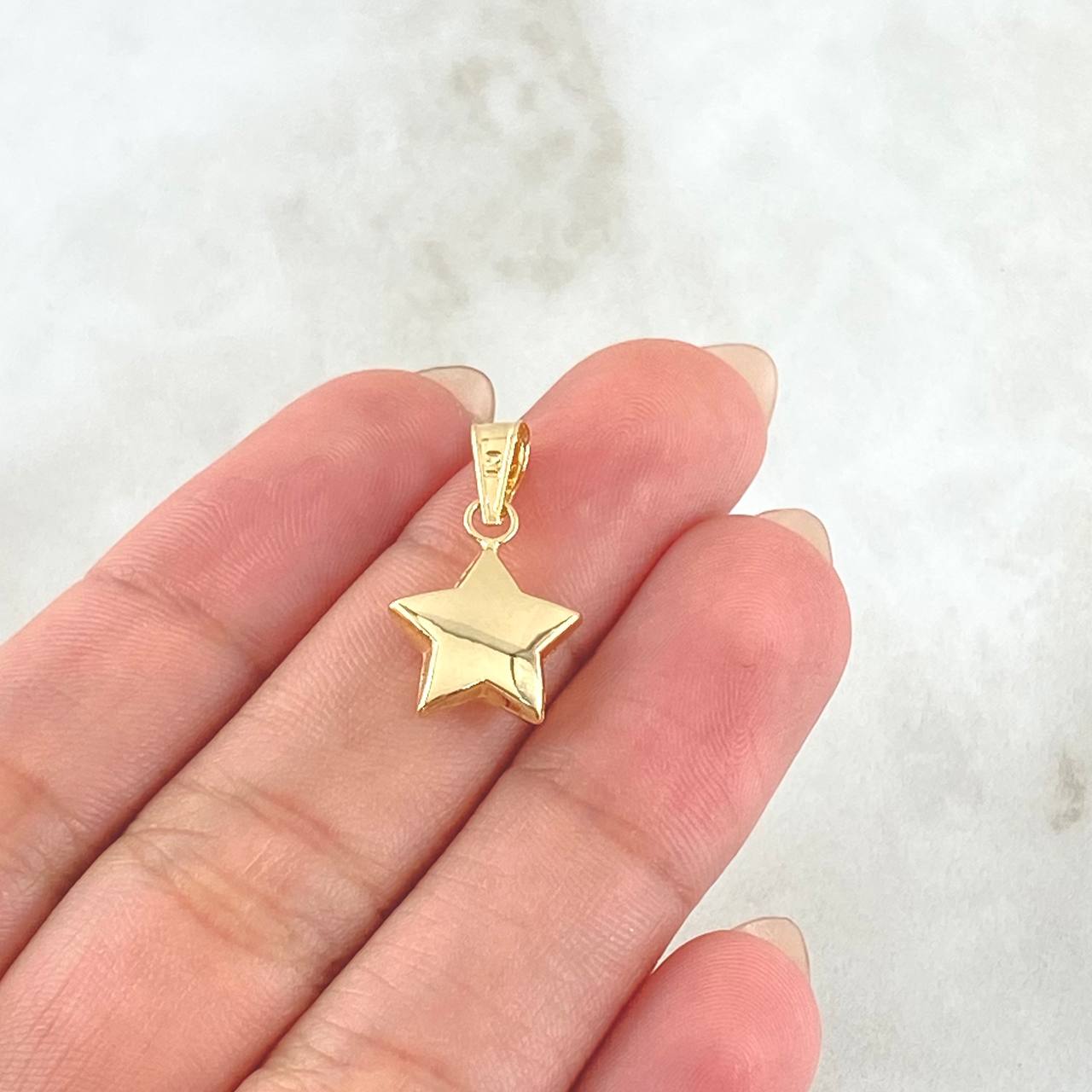 Dije Estrella 0.65gr / 2cm / Oro 18K