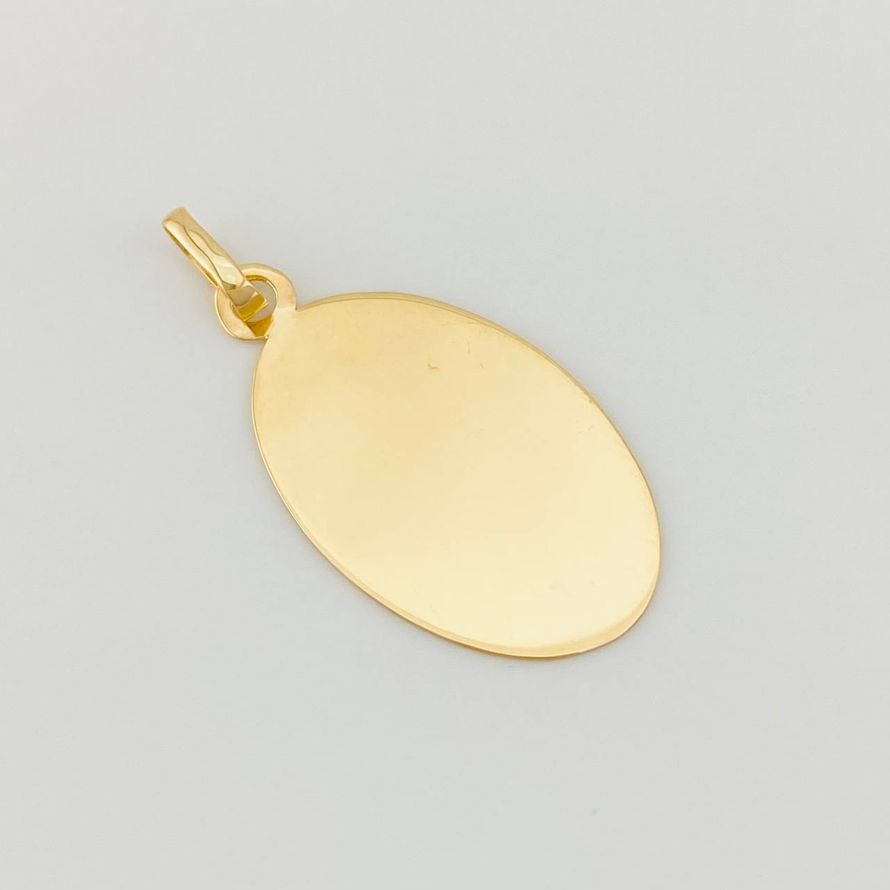 Dije Placa Ovalada 0.8g / 1 in Oro Amarillo 18K